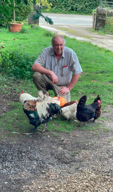 Our farmer with the free-range hens